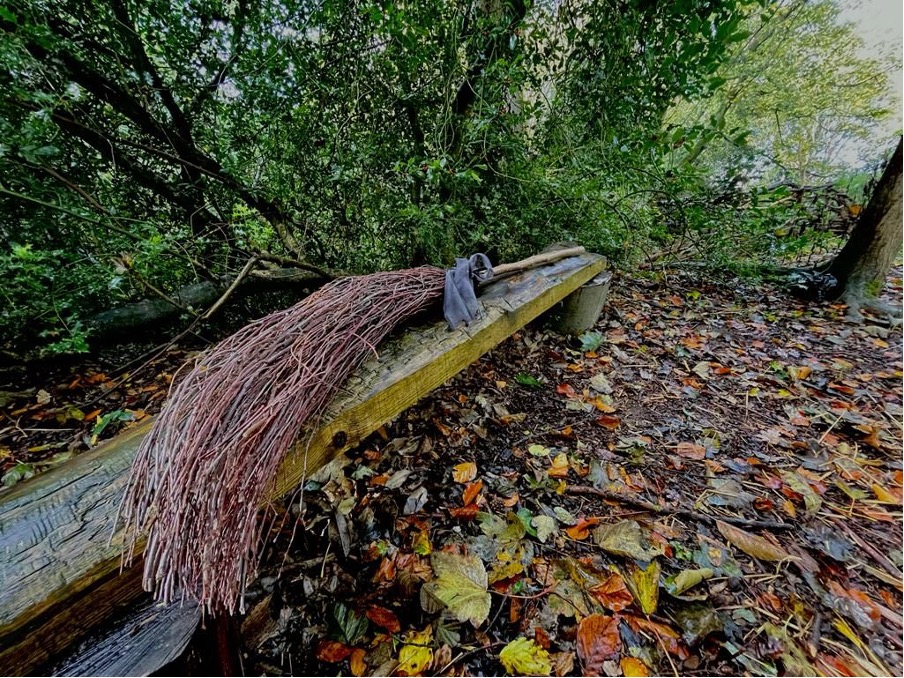 besom on a bench in the autumn
